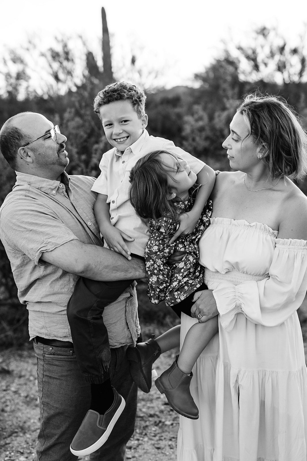 black and white portrait photographed at sunset with golden light